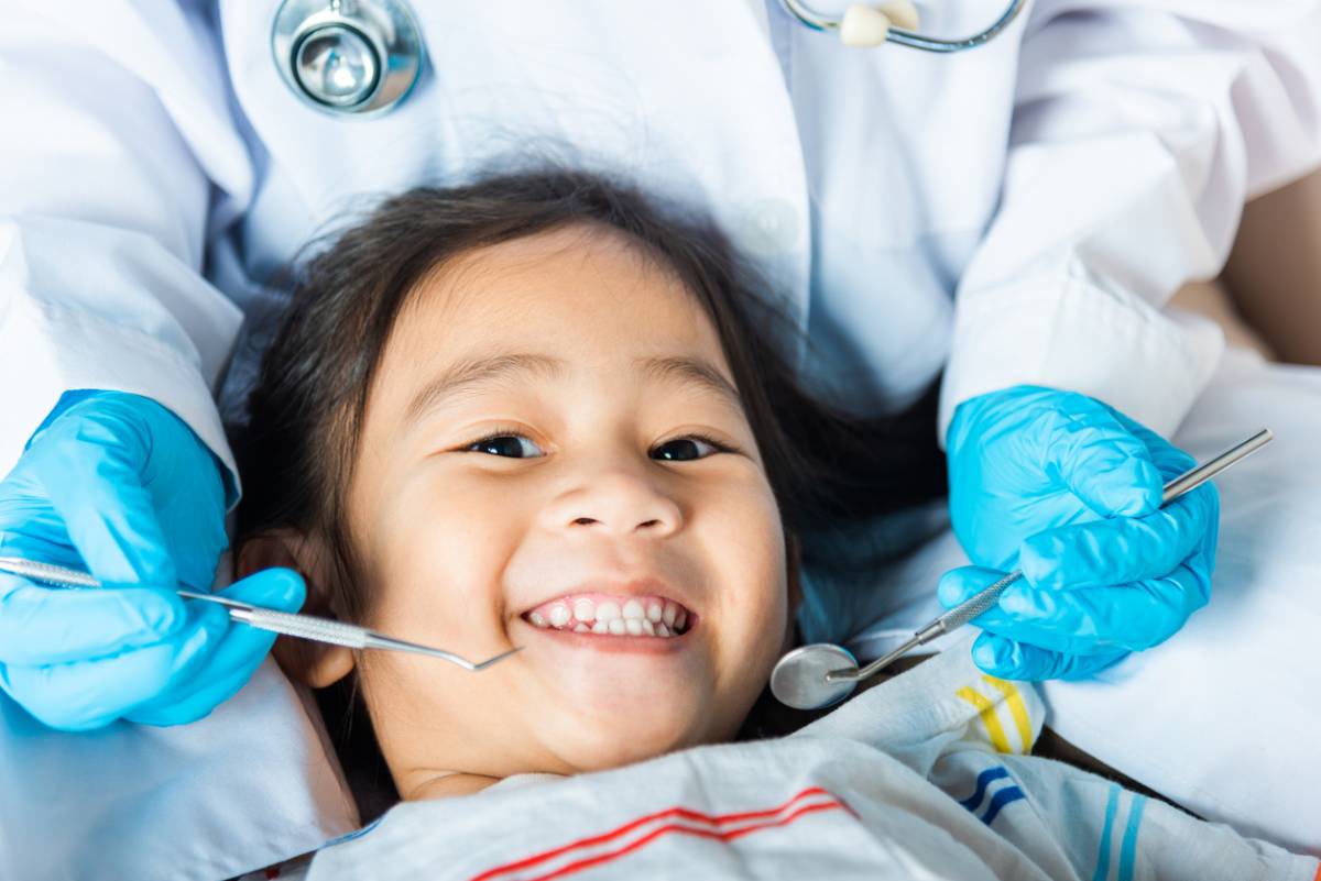 concept image of kid prepared for first dental visit