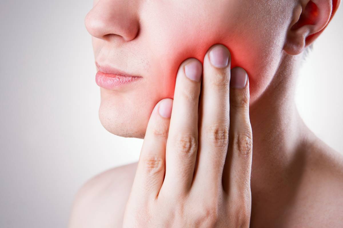 Woman with gum disease who needs a dental emergency